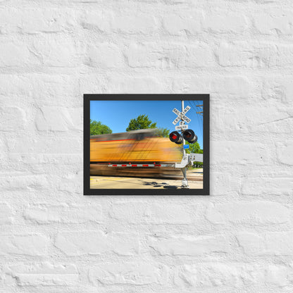 Freight Train Roaring Through an Active Railroad Crossing - Framed Print