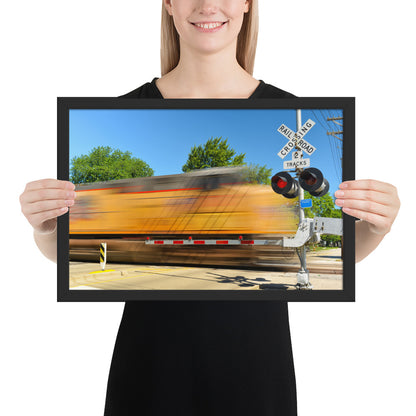 Freight Train Roaring Through an Active Railroad Crossing - Framed Print