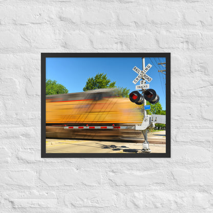 Freight Train Roaring Through an Active Railroad Crossing - Framed Print