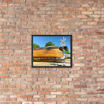 Freight Train Roaring Through an Active Railroad Crossing - Framed Print