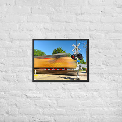 Freight Train Roaring Through an Active Railroad Crossing - Framed Print