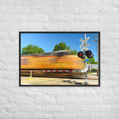 Freight Train Roaring Through an Active Railroad Crossing - Framed Print