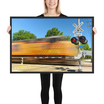 Freight Train Roaring Through an Active Railroad Crossing - Framed Print