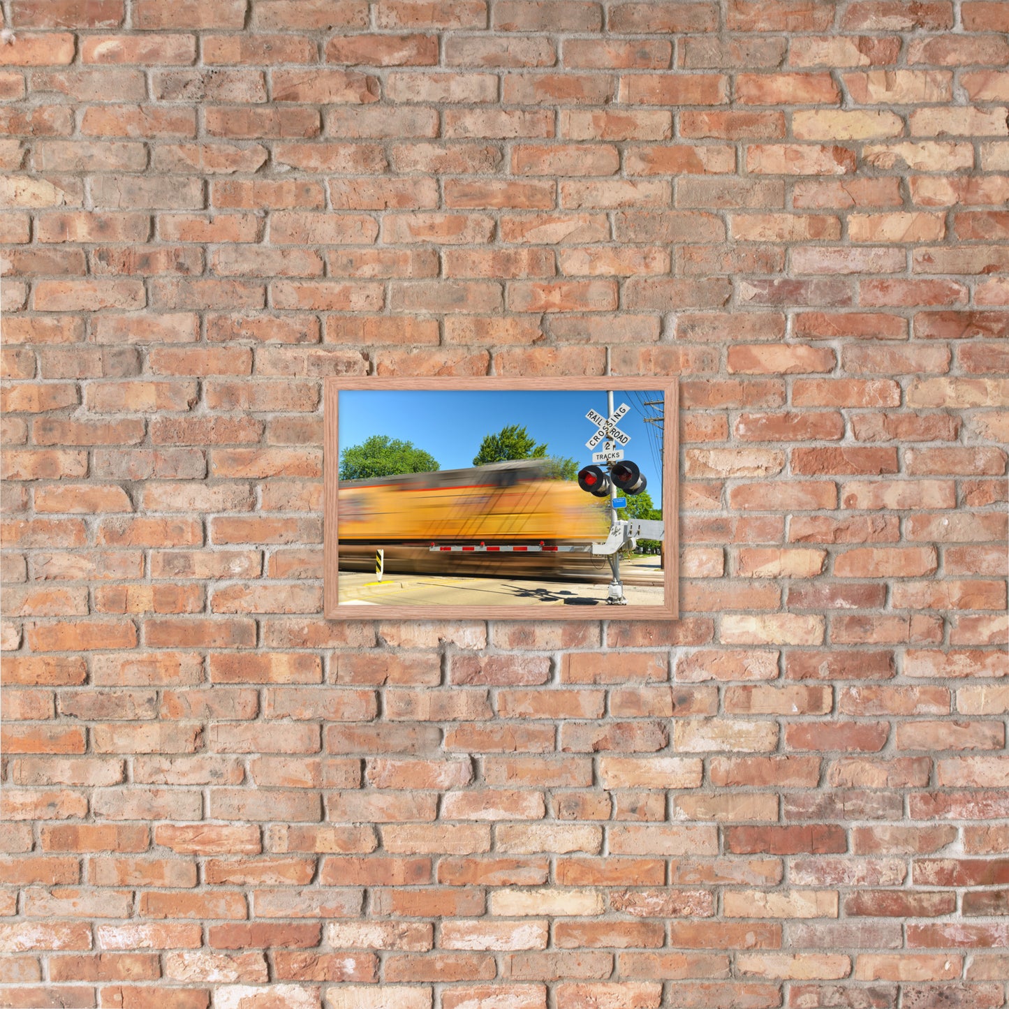 Freight Train Roaring Through an Active Railroad Crossing - Framed Print