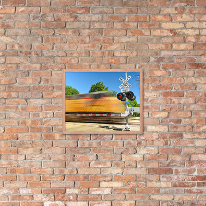 Freight Train Roaring Through an Active Railroad Crossing - Framed Print