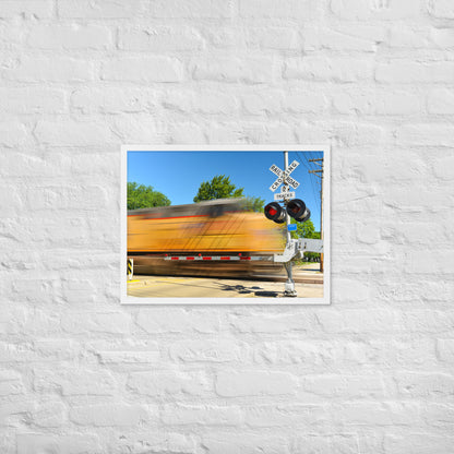 Freight Train Roaring Through an Active Railroad Crossing - Framed Print