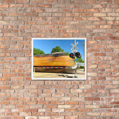 Freight Train Roaring Through an Active Railroad Crossing - Framed Print