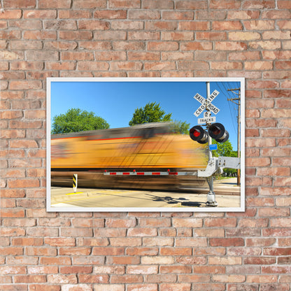 Freight Train Roaring Through an Active Railroad Crossing - Framed Print