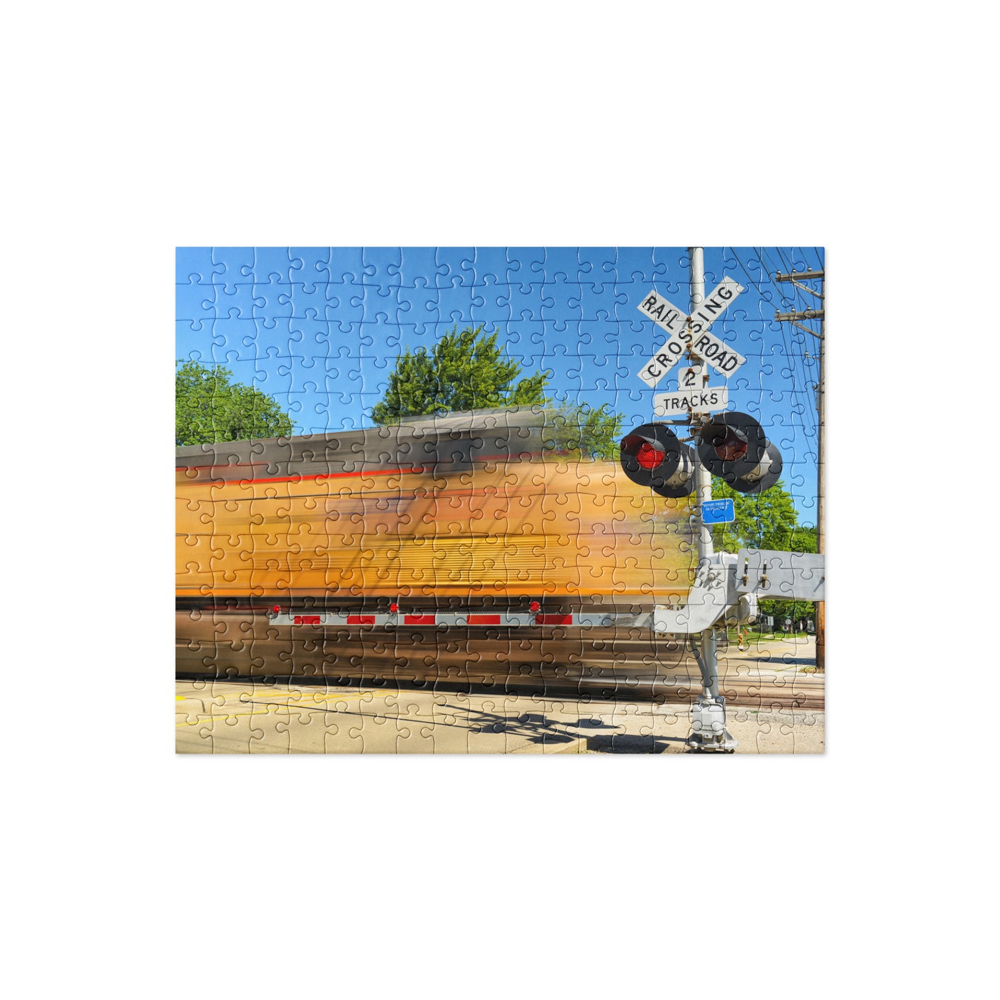 Freight Train Roaring Through an Active Railroad Crossing - Train Puzzle