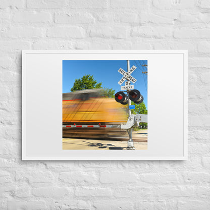 Freight Train Roaring Through an Active Railroad Crossing - Framed Print